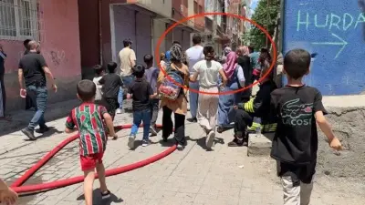 Diyarbakır'da Yangın Sonrası Komşular Arasında Gerilim: İki Kişi Dumandan Etkilendi, Polis Müdahale Etti